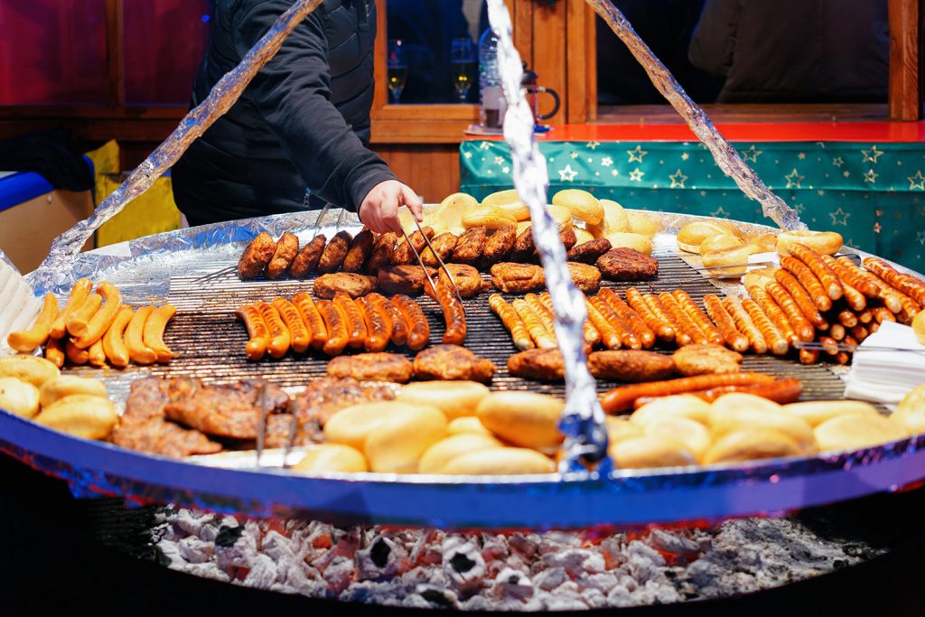 Grilled sausages at Night Christmas Market at Town Hall Berlin
